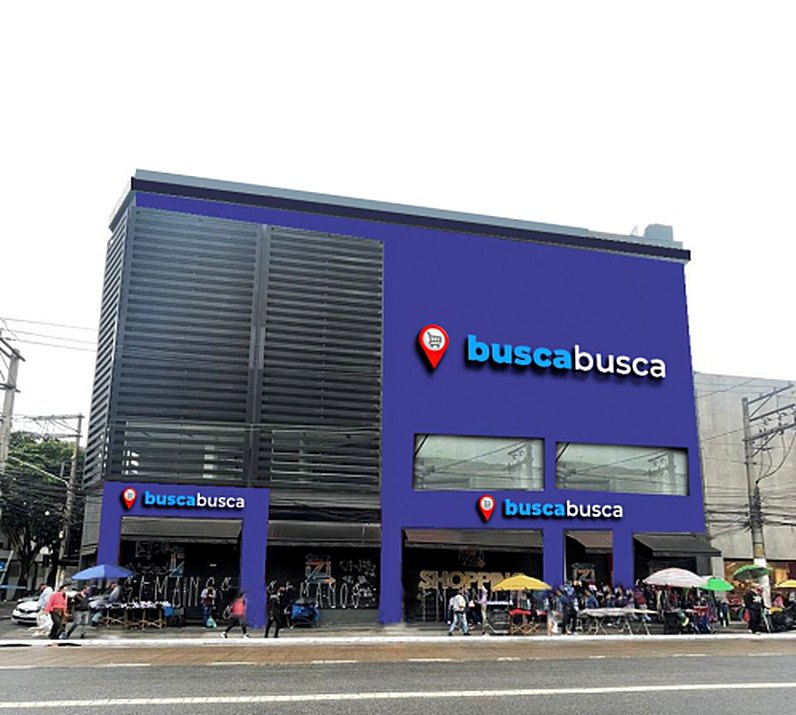 Prédio azul de três andares com a marca Busca Busca na fachada, em Santo Amaro